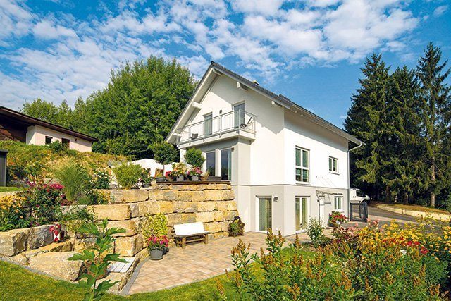 Zusammen leben, getrennt wohnen! - Ein kleines haus in einem garten - FertighausWelt Günzburg